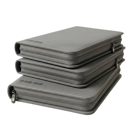 Grail Guard premium zip card binder in gun metal grey, archival-safe 9-pocket trading card portfolio stack on a white background.